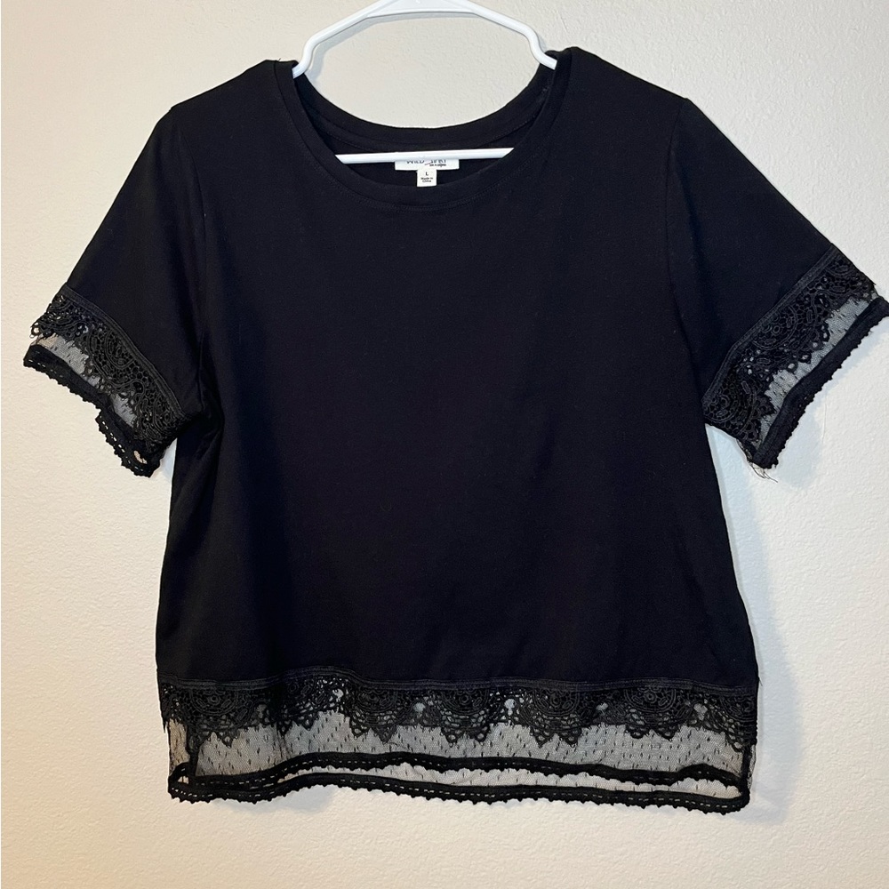 Women’s size large black simi crop blouse with lace at the bottom and both arms
